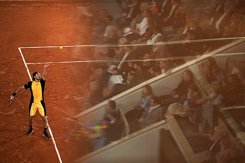 Tsitsipas serves against Spain's Carlos Alcaraz